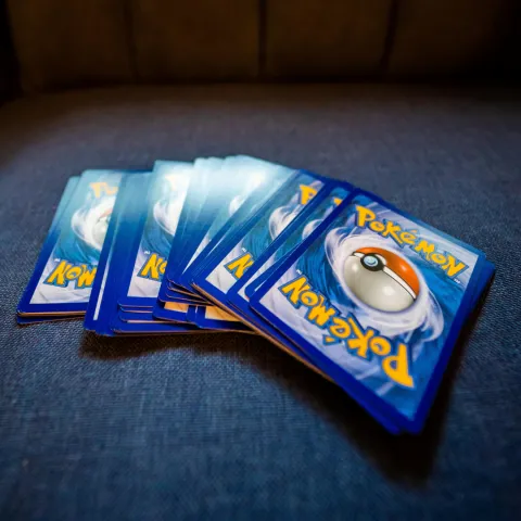 A stack of Pokemon cards fanned out